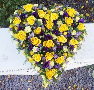 Mixed Flower Heart - At Sarah Coxon Floral Design we are delighted to present this product available for flower delivery in Mid and North Norfolk. 

A mixed flower heart is a modern twist on a traditional funeral tribute. It is full of mixed flowers, which includes Roses, Spray Carnations and other flowers which have been thoughtfully selected to complement the design. It is edged in hand pleated ribbon in a colour co-ordinating waterproof ribbon. 

The flowers are arranged in water retaining foam (oasis) to ensure maximum freshness. 

Standard - approx size 14"

Deluxe - approx size 17"

Luxury - approx size 19"

We deliver directly to all of the local funeral directors and will contact them to confirm a delivery time. 

Our flowers at Sarah Coxon Floral Design arrive fresh from the Dutch auctions every day so you can be rest assured we are using the best quality of flowers available. 

If you would like to choose a colour scheme, please state this in the special request box. . If no colours have been selected we will use the same colours as the picture.