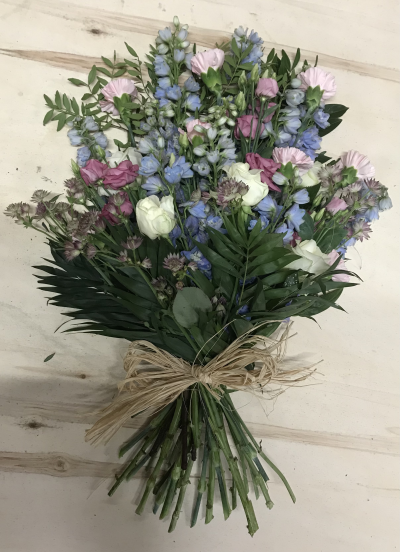 Tied Sheaf - At Sarah Coxon Floral Design we are delighted to present this product available for flower delivery in Mid and North Norfolk. 

This is a natural tied sheaf and is a popular choice for woodland buriels and cremations where the flowers need to be completely biodegradable. This eautiful bunch of blloms is finished with a raffia bow. 

A stunning tied sheaf arrangement which has been arranged in the hand and tied together for a totally natural look. 

Standard - approx size 20"

Deluxe - approx size 25""

Luxury - approx size 30"

We deliver directly to all of the local funeral directors and will contact them to confirm a delivery time. 

There will be at least 4 varieties of flowers and foliage which will have been thoughtfully selected to ensure they complement each other perfectly. Our flowers at Sarah Coxon Floral Design arrive fresh from the Dutch auctions every day so you can be rest assured we are using the best quality of flowers available. 

If you would like to choose a colour scheme, please state this in the special request box. Alternatively you are most welcome to leave it to us to select the colours for you.