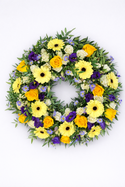 Mixed Wreath - At Sarah Coxon Floral Design we are delighted to present this product available for flower delivery in Mid and North Norfolk. 

A traditional wreath is a perfect funeral tribute for a loved one. 

A beautiful mixed wreath full of flowers which has been arranged in water retaining foam (oasis) to ensure maximum freshness. 

Standard - approx size 14"

Deluxe - approx size 16"

Luxury - approx size 18"

We deliver directly to all of the local funeral directors and will contact them to confirm a delivery time. 

There will be at least 4 varieties of flowers and foliage which will have been thoughtfully selected to ensure they complement each other perfectly. Our flowers at Sarah Coxon Floral Design arrive fresh from the Dutch auctions every day so you can be rest assured we are using the best quality of flowers available. 

If you would like to choose a colour scheme, please state this in the special request box. Alternatively you are most welcome to leave it to us to select the colours for you.